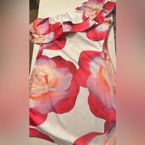 Floral satin like material, slim fit, one shoulder, short dress size M